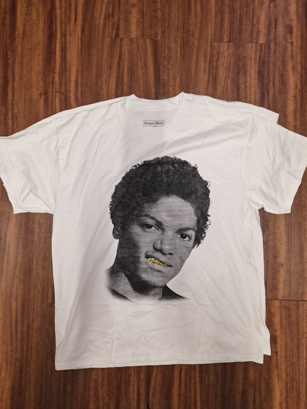 Nostalgia White Short-Sleeve Tee with Black Portrait and Gold Grill Accent